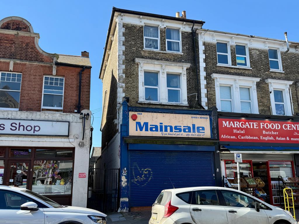 Lot: 18 - MIXED USE PROPERTY WITH PLANNING FOR ADDITIONAL MAISONETTE TO REAR - Mixed-use end-terrace building